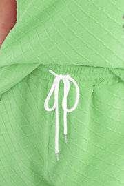 Neon green textured knit loungewear set with drawstring waist
