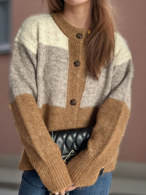 Colorblock crewneck button-down knit cardigan in beige, caramel, and gray acrylic with button details.