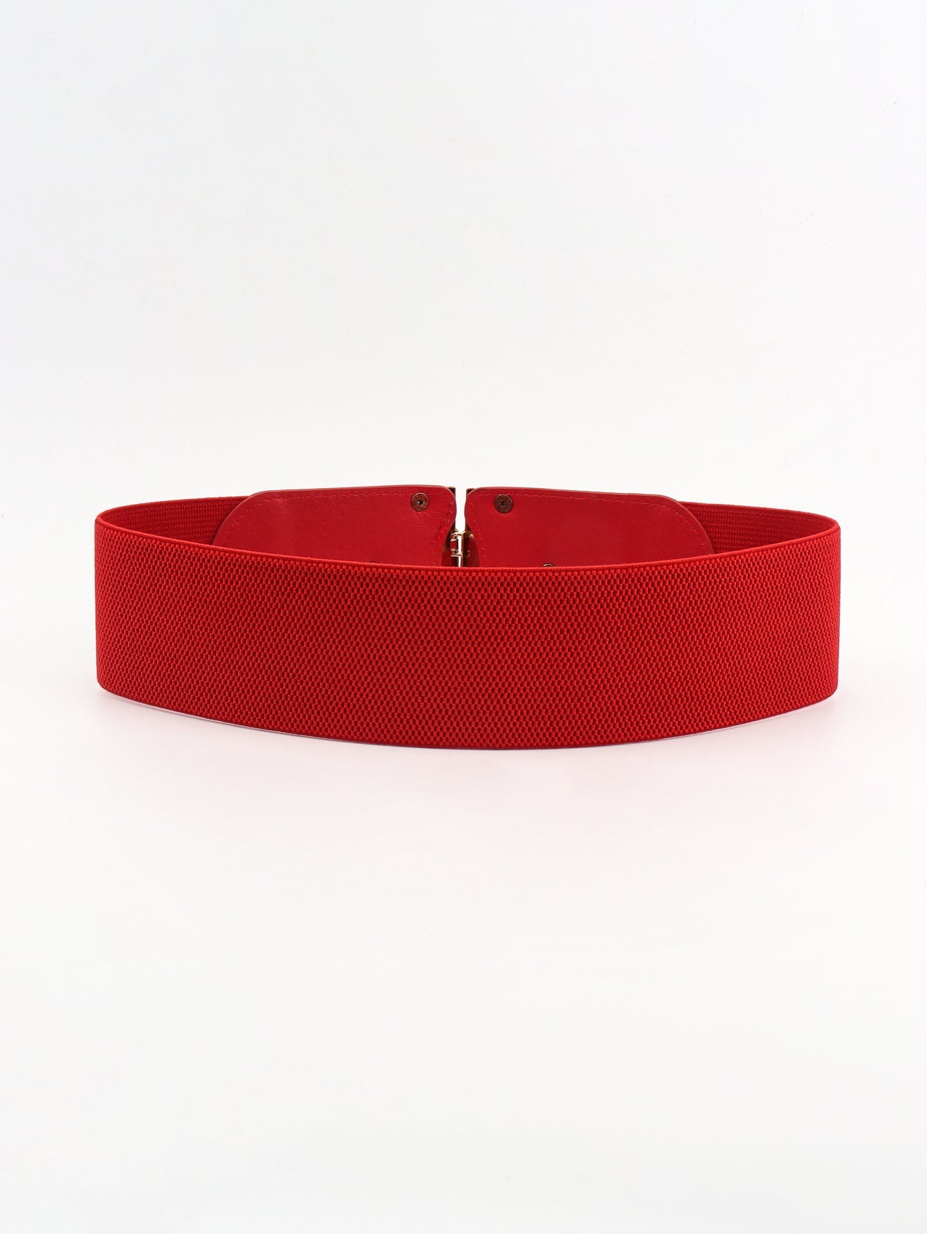 Red elastic belt with double-D buckle and textured fabric.