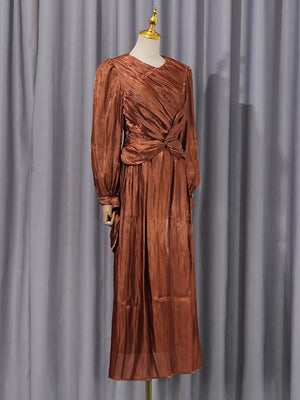 Brown twisted draped maxi dress with ruched bodice and long sleeves