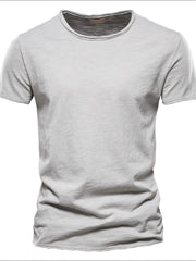 Gray textured slub cotton crewneck tee with short sleeves and a raw hem.