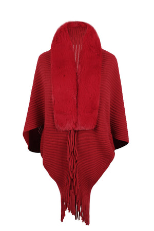 Red knit cape with faux fur collar and fringe detail