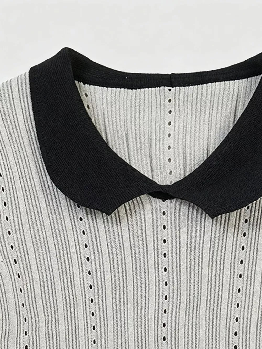 Gray maternity t-shirt with black Peter Pan collar and eyelet details