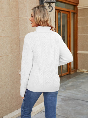 Cable knit turtleneck sweater in white with textured pattern, acrylic material.