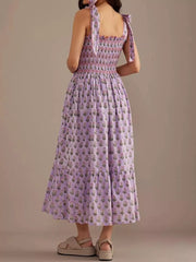 Lilac floral midi dress with smocked bodice and tie straps