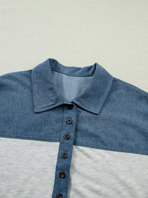 Two-tone denim polo shirt with button-down front and classic collar.
