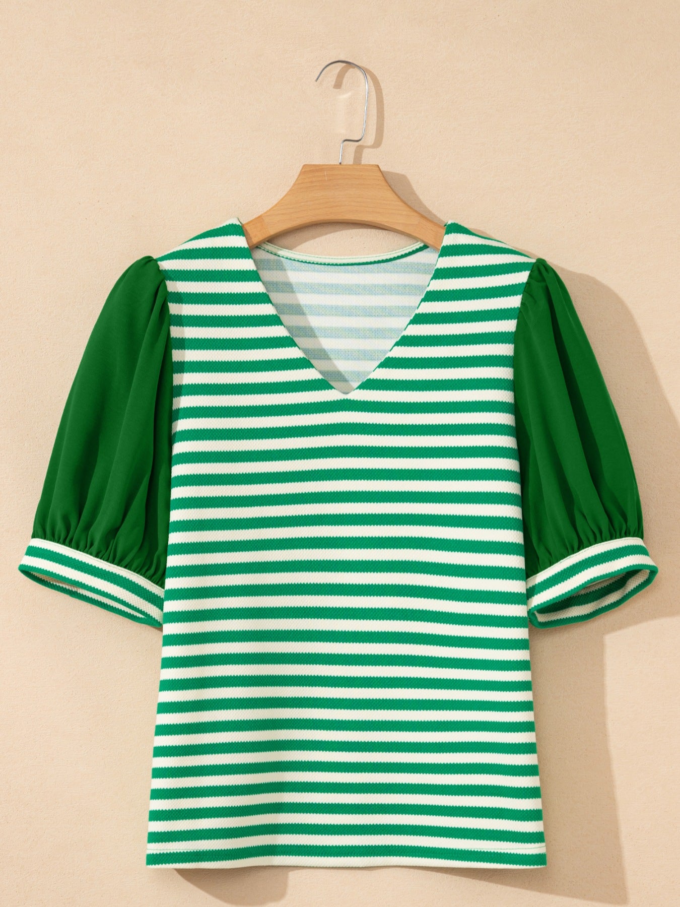Green and white striped v-neck shirt with puff sleeves