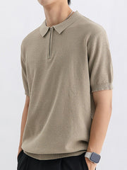 Textured knit zip-up polo shirt in apricot for men, short sleeves, collared neckline.