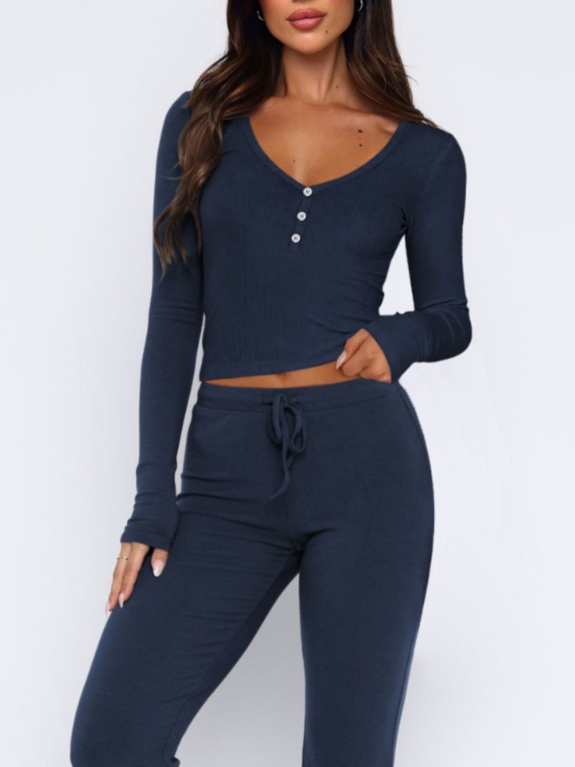Navy ribbed loungewear set with V-neck henley crop top and drawstring pants.