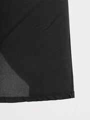 Black midi dress with lace-up detail and pockets, shown in a close-up of the fabric.