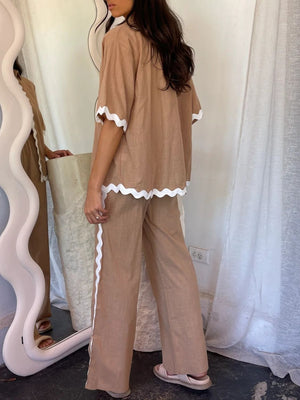 Camel outfit set with half-sleeve top and pants, featuring white scalloped trim.