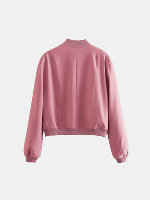 Boxy bomber jacket in Dusty Pink with ribbed collar, cuffs, and hem.