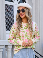 Floral tapestry crewneck sweater in pastel yellow with pink blooms and green stems, acrylic knit.
