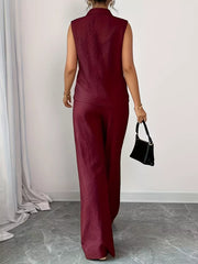 Burgundy sleeveless collared top and wide-leg pants set with textured fabric.