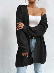 Black longline knit open cardigan with subtle eyelet details on sleeves.