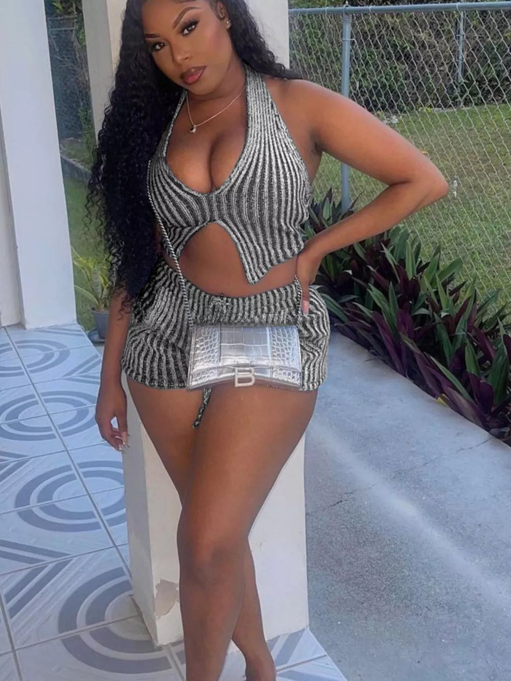 Chic striped halter top and shorts set with cut-out detail