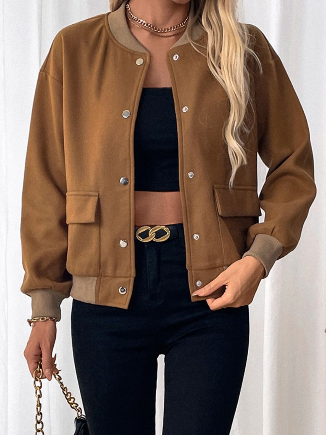 Caramel felted wool-blend bomber jacket with snap buttons and two front pockets.