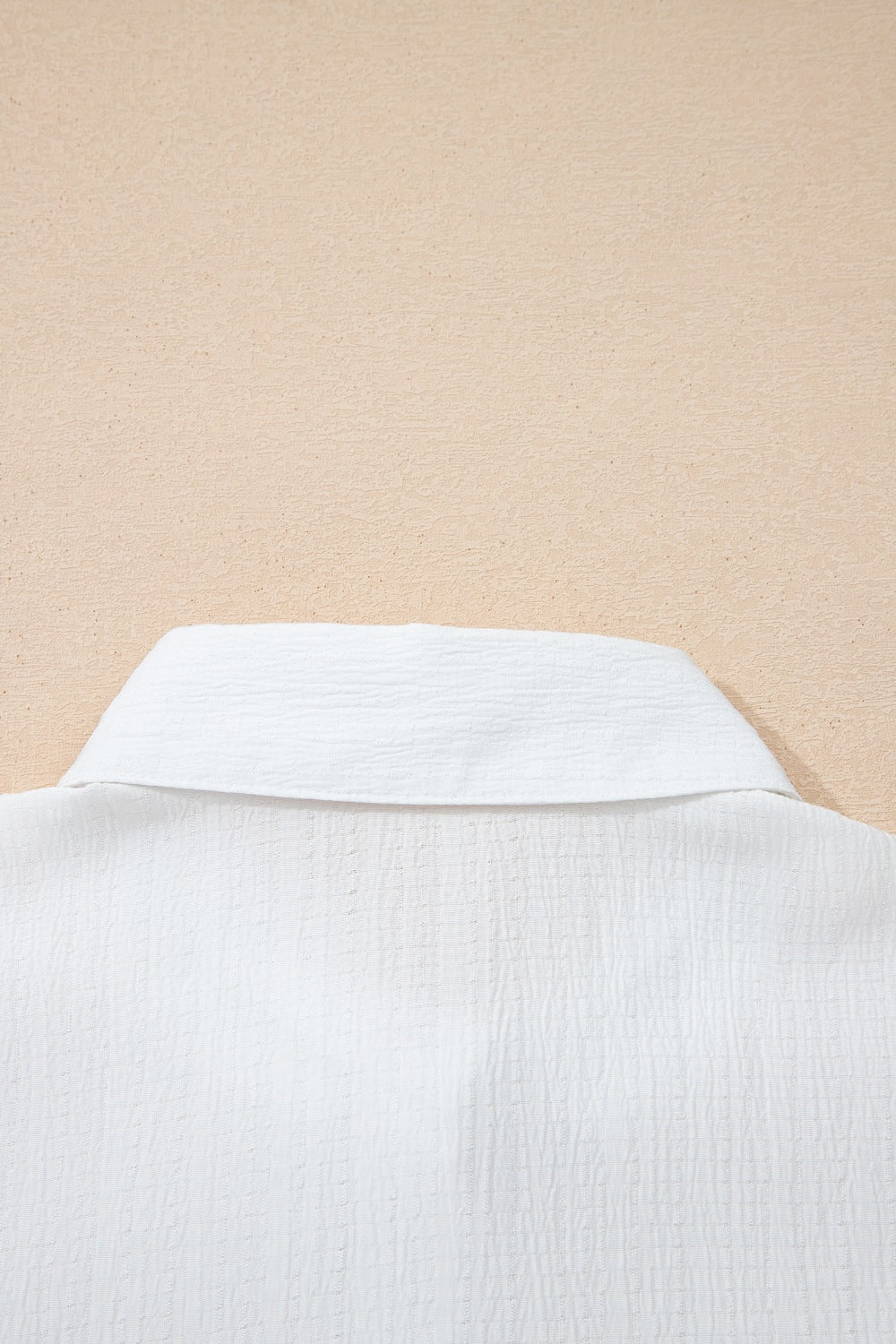 White crinkled texture button-down shirt with classic collar detail