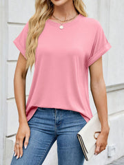 Basic cuffed sleeve t-shirt in Blush Pink with a crew neck, styled casually.
