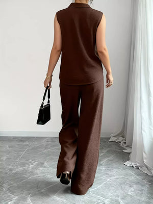 Brown sleeveless collared top and wide-leg pants set with textured fabric.