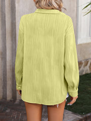 Textured pleat oversized button-down shirt in Yellow-Green with long sleeves and a collared neckline.