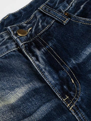 Men's distressed blue wide-leg bootcut jeans with button closure detail.