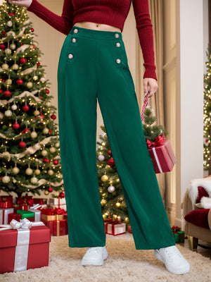 Dark green wide-leg trousers with button detail and a high waist.