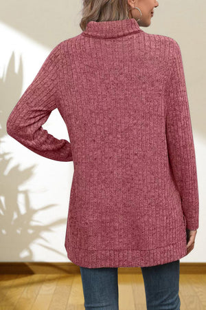 Ribbed knit turtleneck tunic top in Cerise with long sleeves and a relaxed fit.