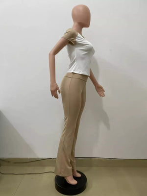 Chic contrast tee and pants set in camel and white, body-hugging casual outfit.
