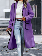 Purple teddy coat with contrast trim, open front, long sleeves, and patch pockets.