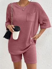 Relaxed ribbed lounge set in Dusty Pink with crew neck top and shorts, featuring a chest pocket.