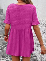 Textured babydoll blouse in magenta with flutter sleeves and smocked waist
