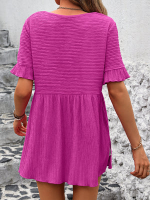 Textured babydoll blouse in magenta with flutter sleeves and smocked waist
