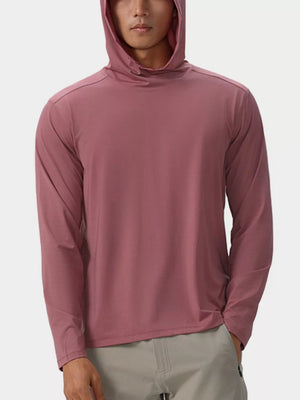 Men's dusty pink long sleeve cotton hoodie with a relaxed fit.
