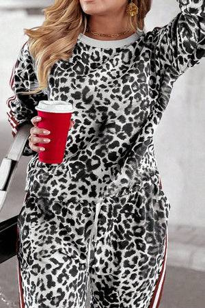 Leopard print joggers with sporty side stripes and drawstring waist.