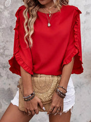 Red ruffled sleeve blouse with button detail and round neckline.
