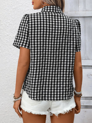 Black gingham button-up short-sleeve shirt with puff sleeves.