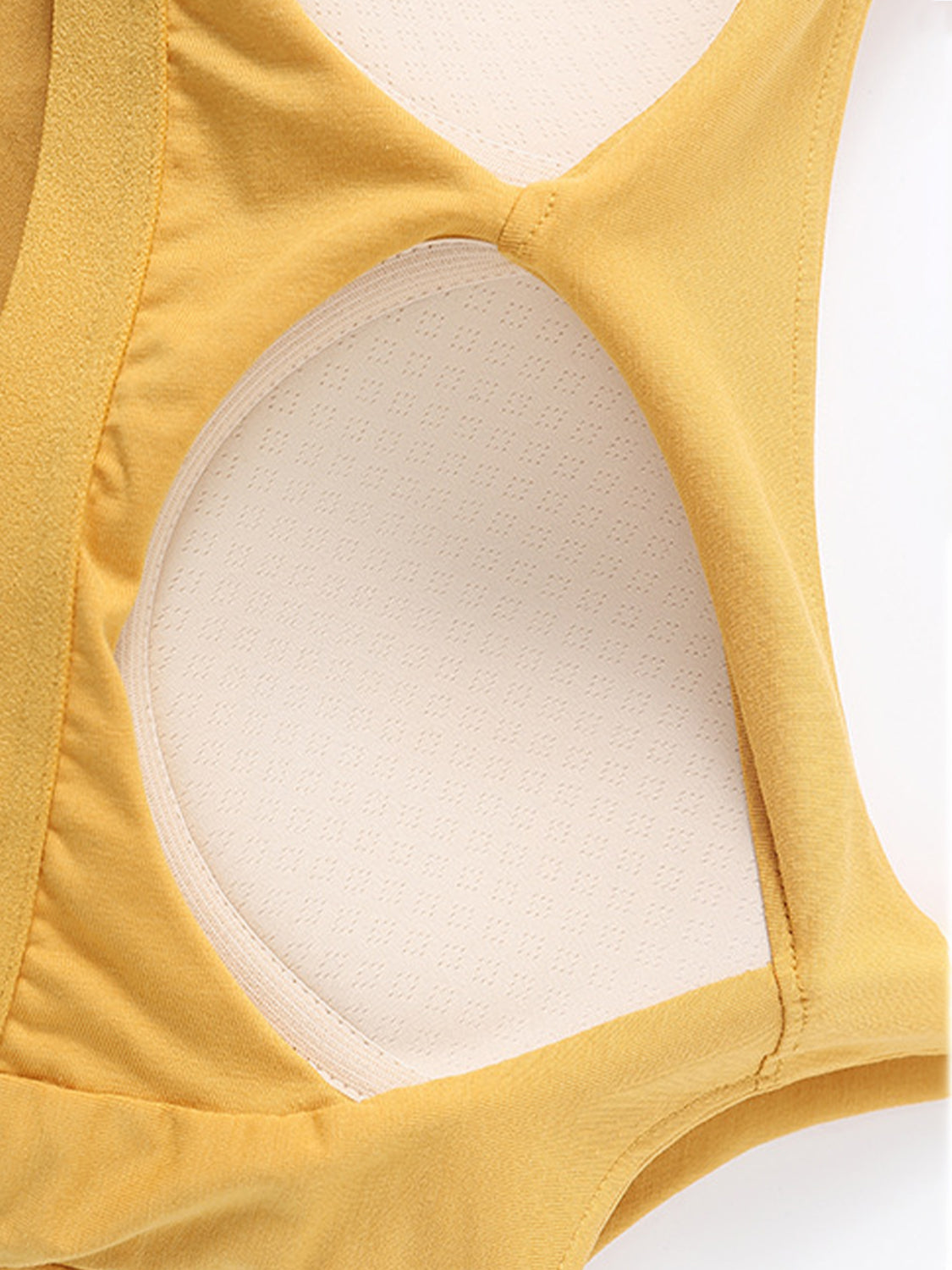 Built-in bustier crop camisole in mustard yellow with a textured inner cup detail.