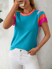 Colorblock knit top in sky blue with flutter sleeves and striped neckline.