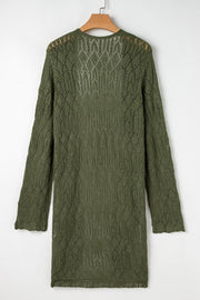 Openwork maxi cardigan in army green acrylic with a diamond pattern and long sleeves.