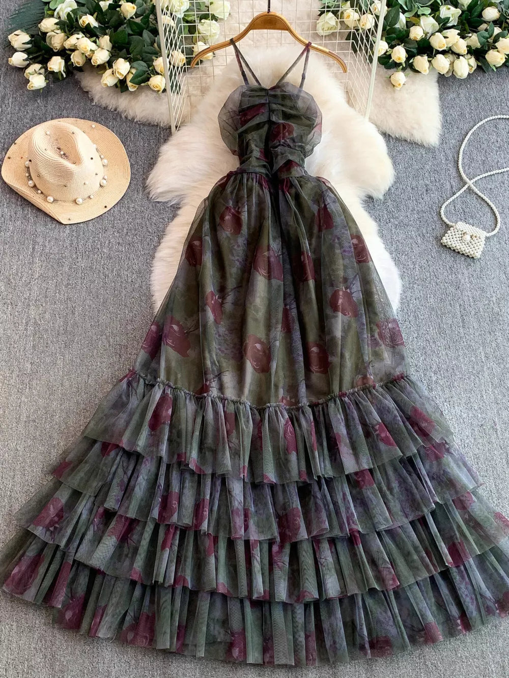 Romantic floral mesh maxi dress with tiered ruffles and ruched bodice.