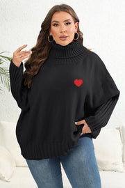 Black turtleneck knit sweater with batwing sleeves and red heart appliqué