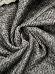 Gray men's sweatpants with a subtle chevron pattern and visible stitching detail.
