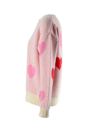 Blush pink intarsia knit crewneck sweater with allover heart pattern and cream ribbed trim.
