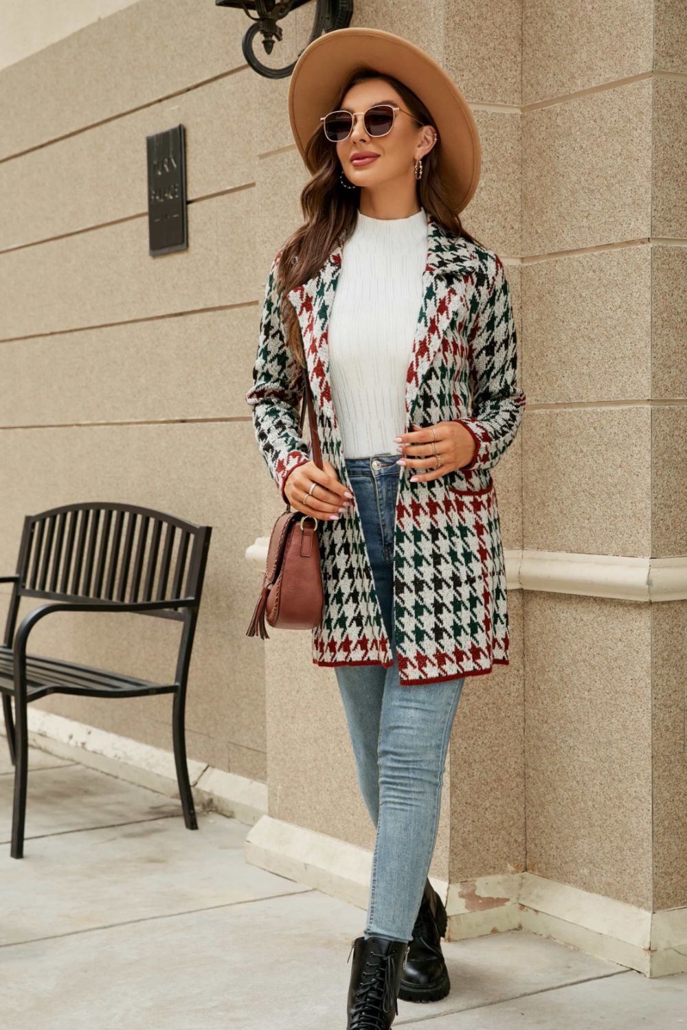 Grid-print knit blazer coat in white, green, and red houndstooth with a relaxed fit.