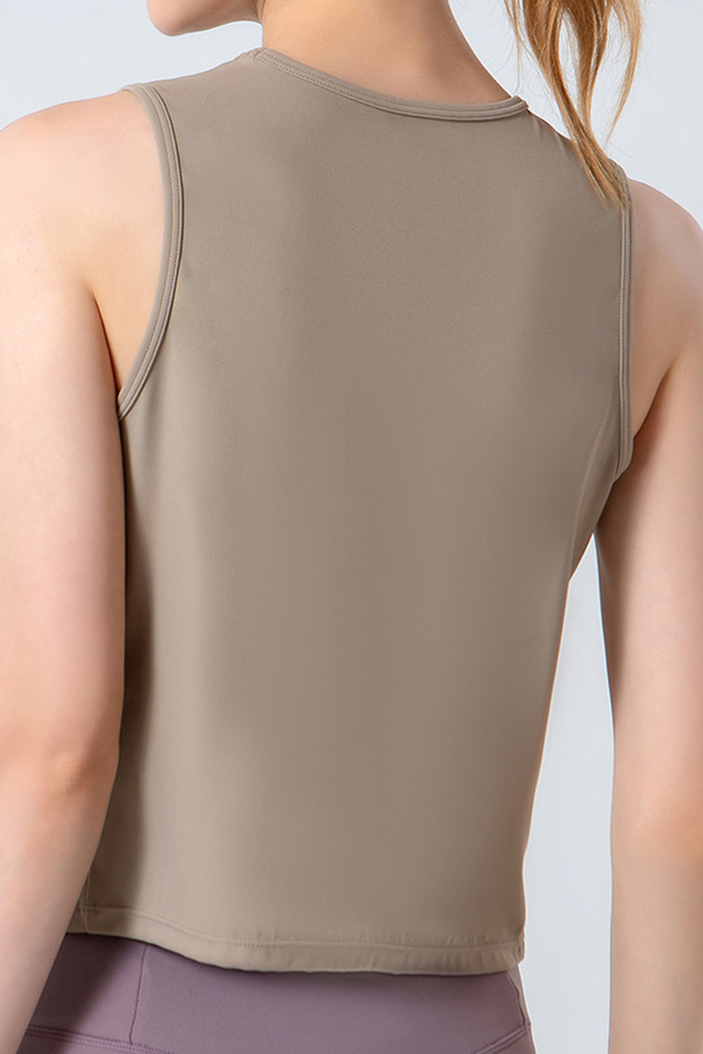 Sculpted Performance Tank Top in Tan with a rounded neckline and sleeveless design.