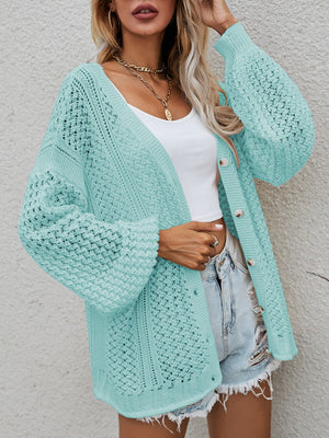 Open-knit button-down cardigan in turquoise with balloon sleeves and a relaxed fit.
