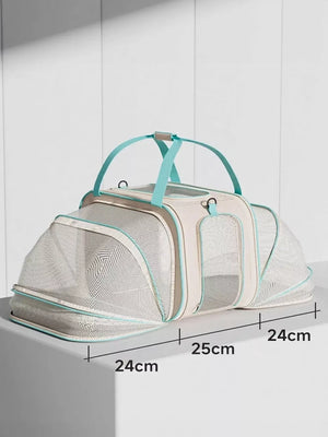 Beige and teal mesh pet carrier backpack with top handles and clear front panel.