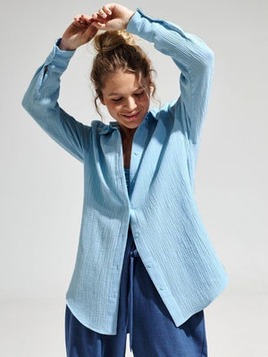 Light blue textured cotton overshirt with relaxed fit and button front