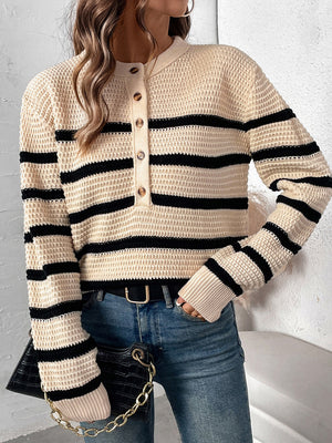 Tan waffle knit henley sweater with black stripes and button detail.